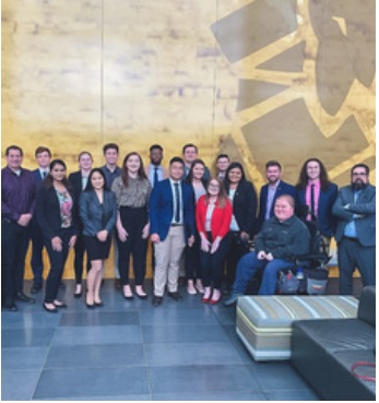 A group of students from the College of Business standing in the lobby of Goodyear in Akron, Ohio.