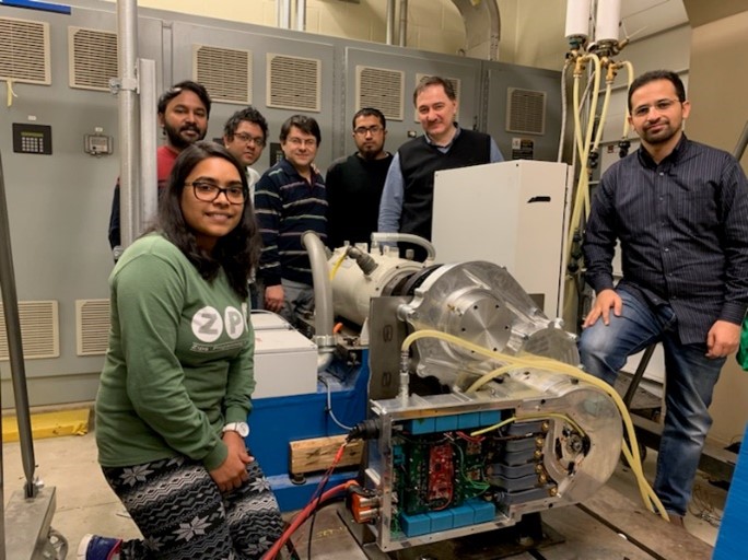 Dr. Sozer with his graduate students at the Center for Advanced Vehicles and Energy Systems (CAVES) at UA.