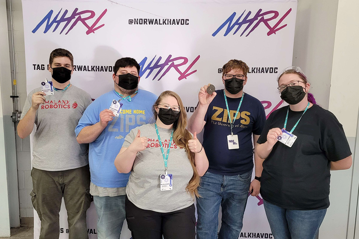 The Phalanx Robotics team at a NHRL competition on November 12, 2022, in Norwalk, CT. Pictured left to right: Jacob Yost, Christopher Pennington, Sierra Cleland, Christopher Roan and Christina Sayre.