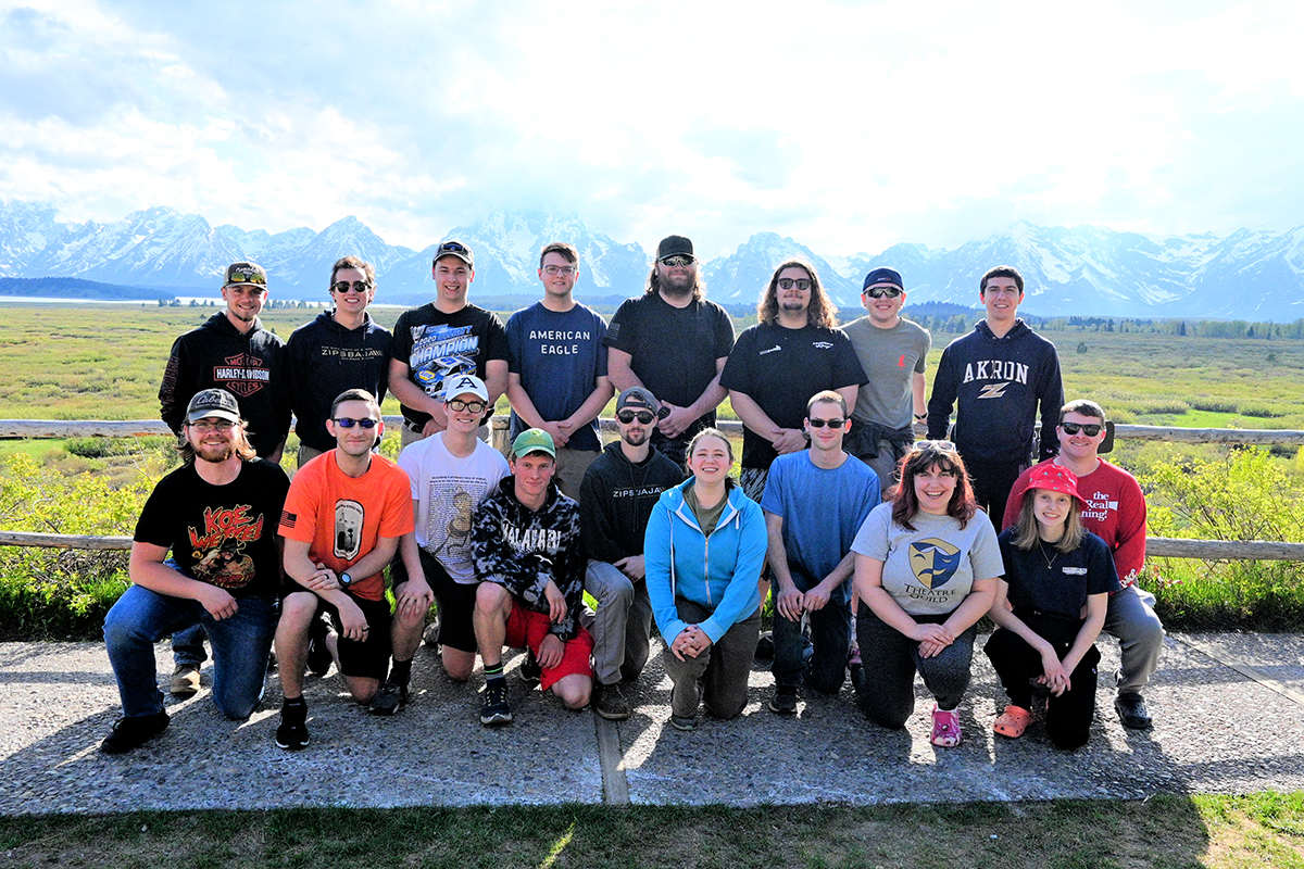 Zips Baja Racing Team members pose at Grand Teton National Park. Pictured left to right: Back row - Hunter Lude, David Scruppi, Alexander Rawson, Colin McConnell, Blayne Bartter, Trent Bolek, Nikolas Kulin and Joseph Wisniewski. Front row - Caleb Malboeuf, Aidan Sullivan, Zane Raymond, Nathan Thompson, Hunter Bonk, Hannah Adams Gemmell, Colton Zanko, Isabella Sandberg, Bridget Green and Chase Lane.